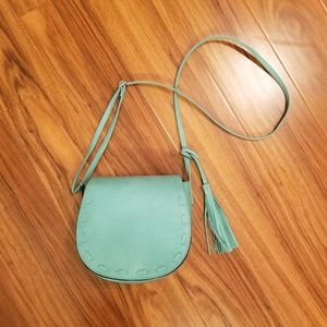 Turquoise crossbody bag with tassel